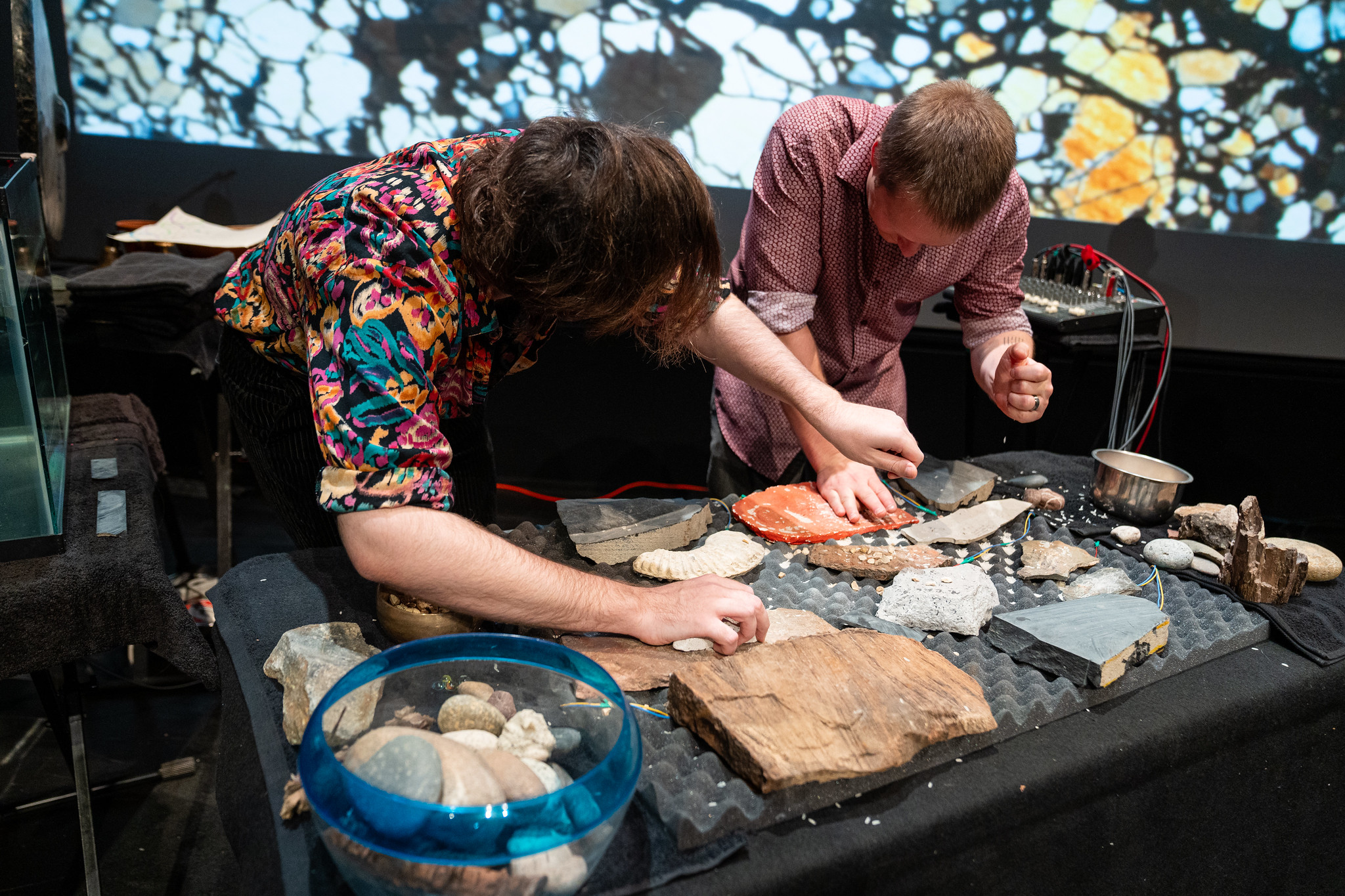 Stephen de Filippo performing amplified stones in Reading Mantle Petrology.